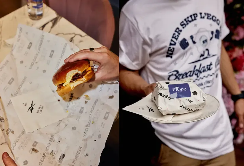 Split view showing a hand holding a burger and a man holding a wrapped "Reebok Egg Day" burger.
