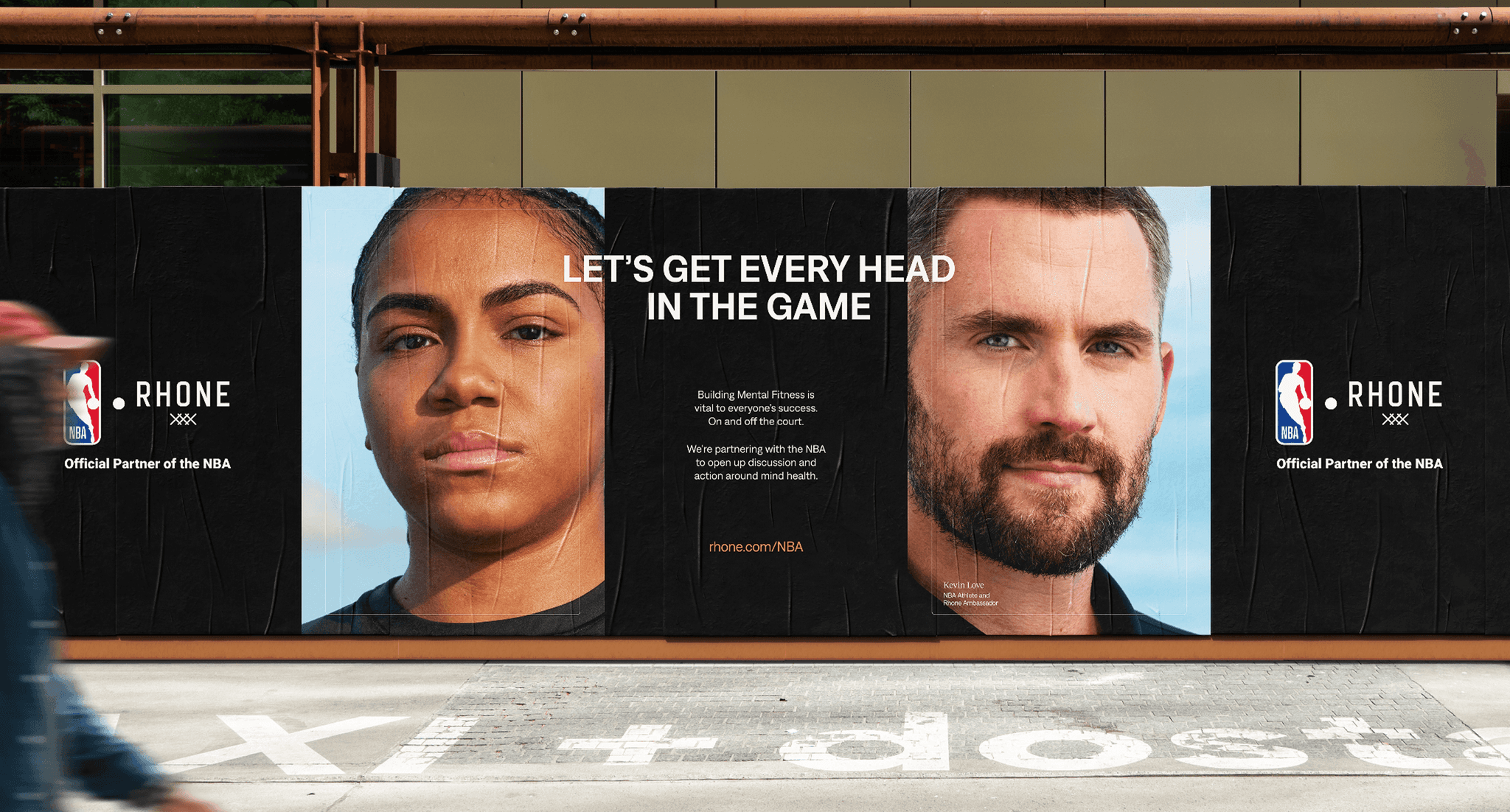 Outdoor advertising banner for Rhone featuring athletes and NBA branding.