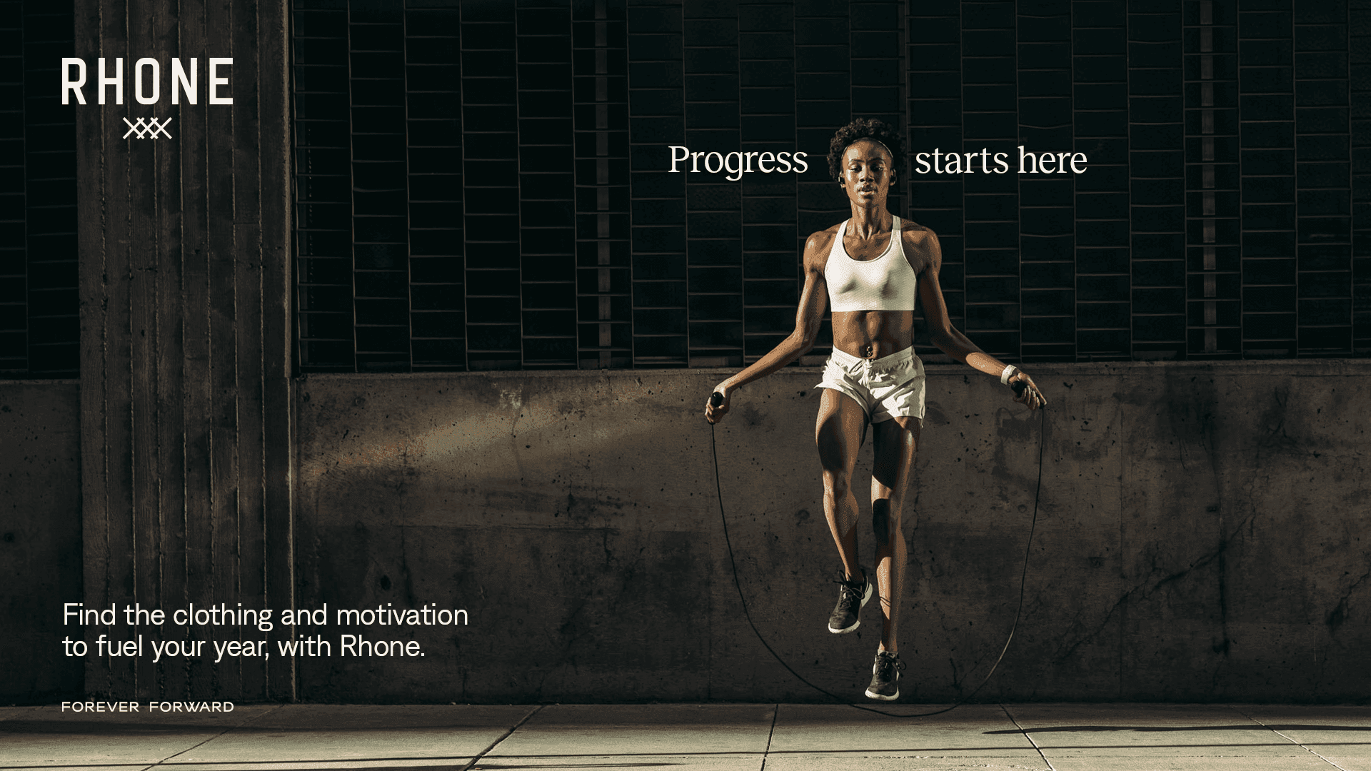 Action shot of an athlete jumping rope with motivational brand text on a dark background.